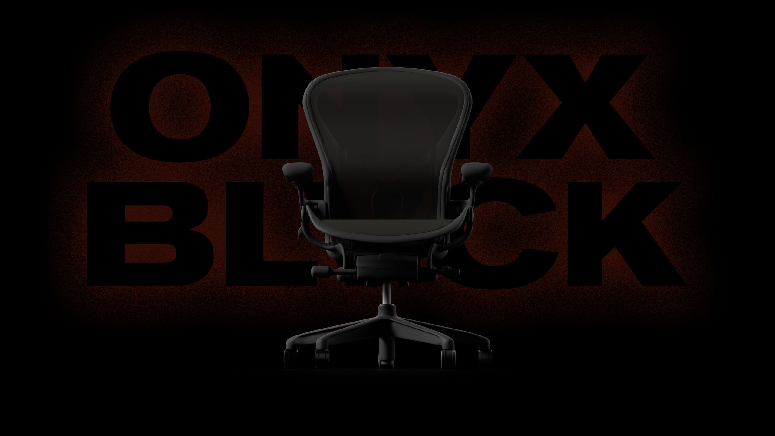 Herman Miller zwarte bureaustoel Aeron onyx met een zwarte achtergrond